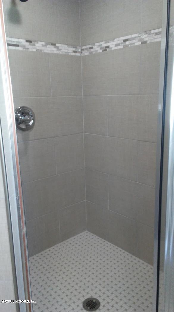 1780 Denmark Drive Fleming Island, FL 32003 - Photo 16 of 25 a bathroom with a shower