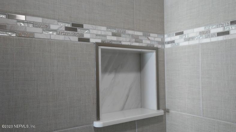 1780 Denmark Drive Fleming Island, FL 32003 - Photo 17 of 25 a bathroom with a shower