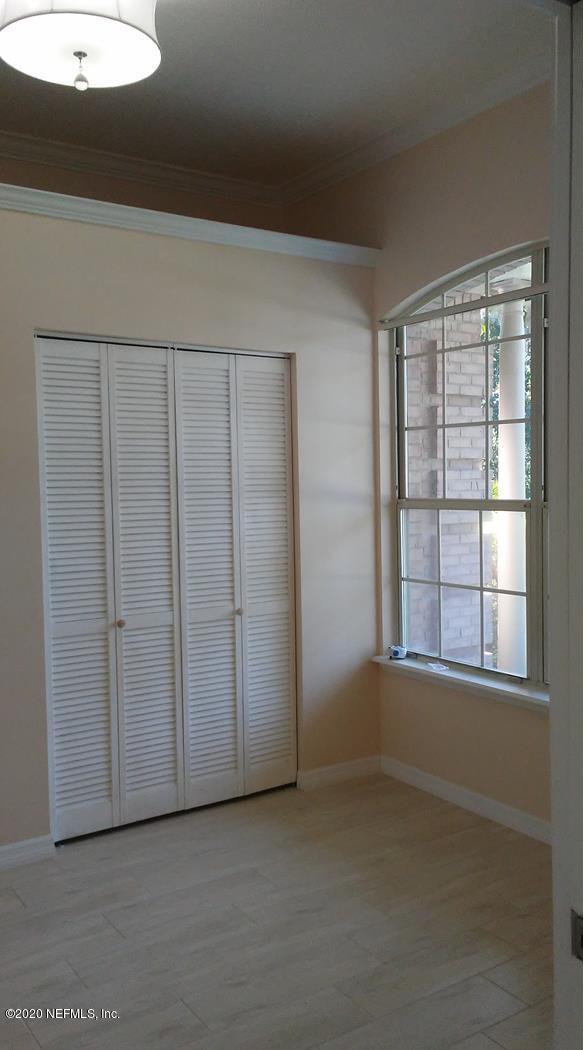 1780 Denmark Drive Fleming Island, FL 32003 - Photo 20 of 25 an empty room with windows