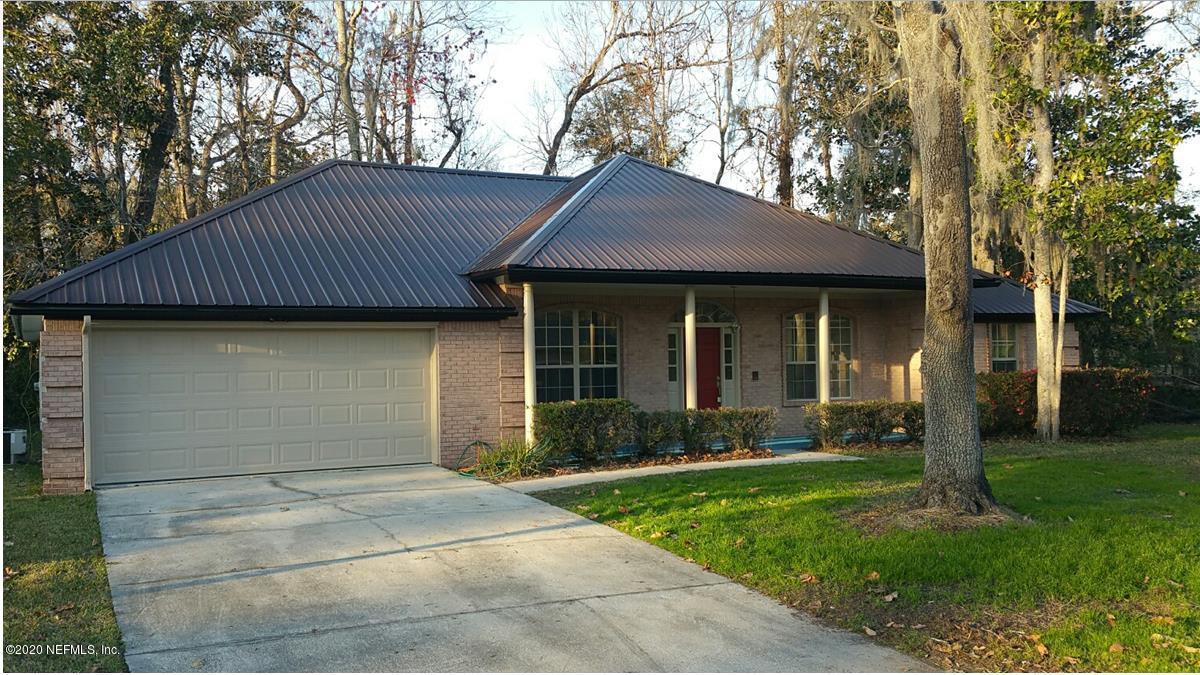 1780 Denmark Drive Fleming Island, FL 32003 - Photo 2 of 25 a front view of a house with garden