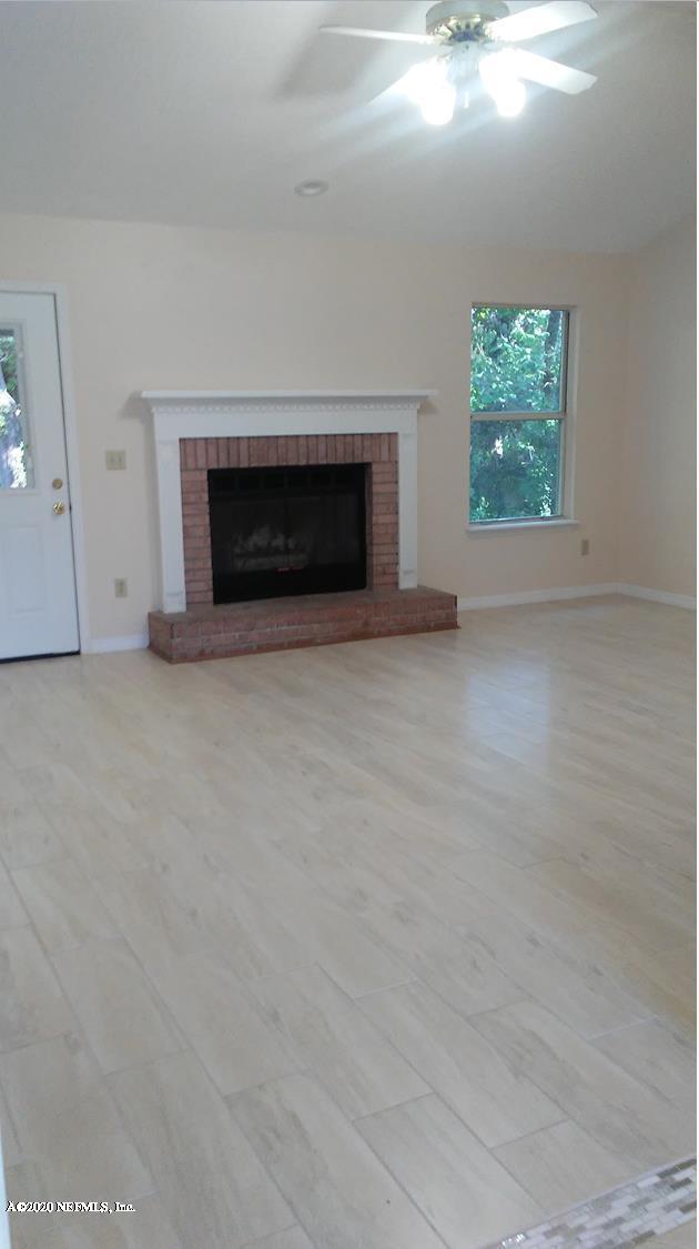 1780 Denmark Drive Fleming Island, FL 32003 - Photo 4 of 25 an empty room with windows