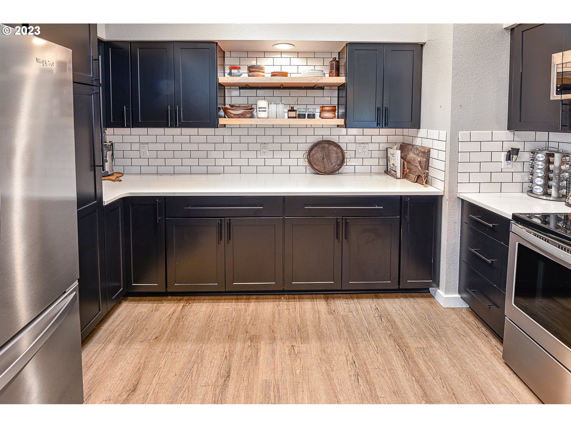 5676 D Street Springfield, OR 97478 - Photo 17 of 29 a kitchen with a sink and a stove