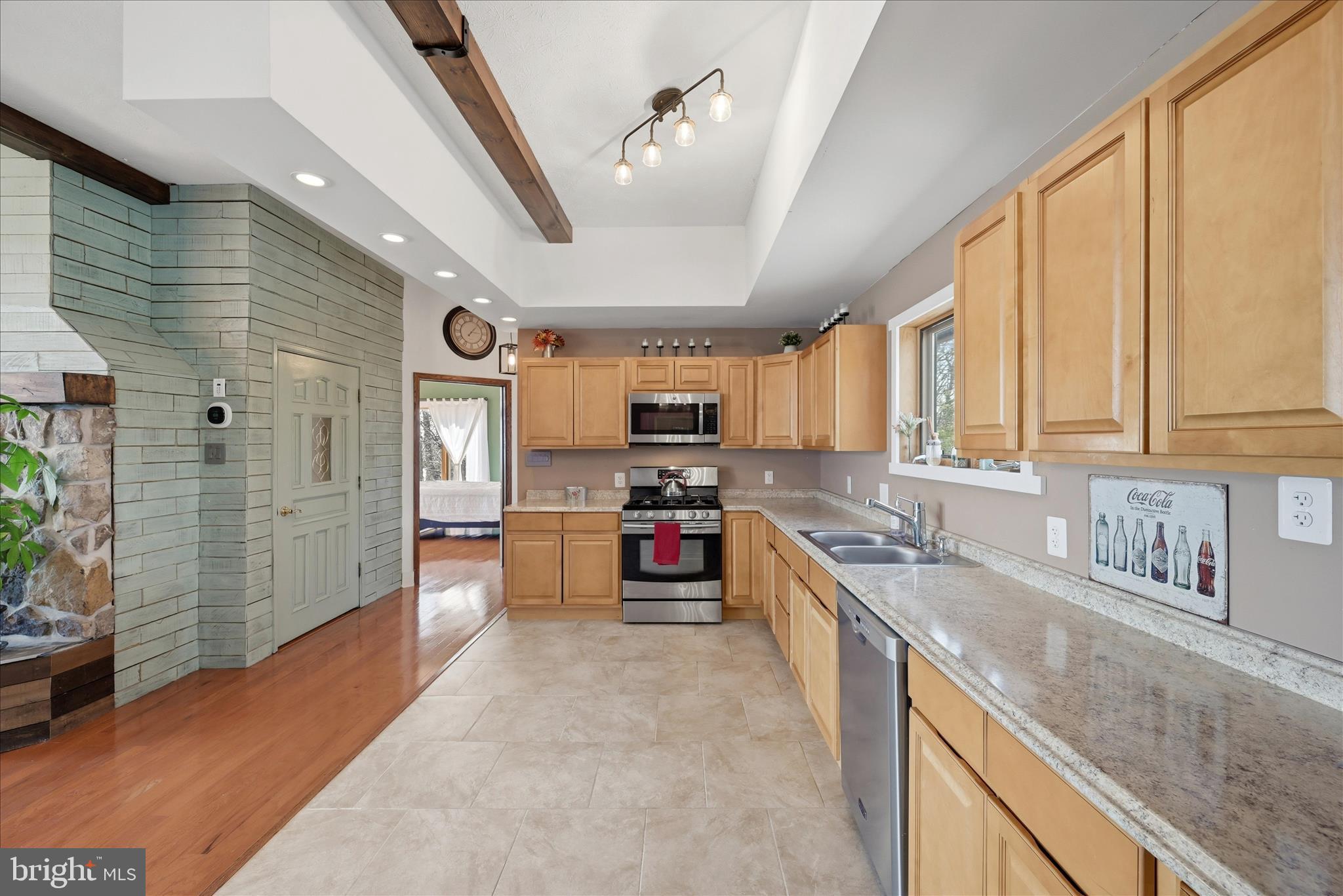2152 Supinlick Ridge Road Broadway, VA 22815 - Photo 22 of 89 a large kitchen with stainless steel appliances granite countertop a sink and cabinets