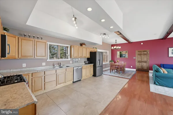 a view of a glass door and a window