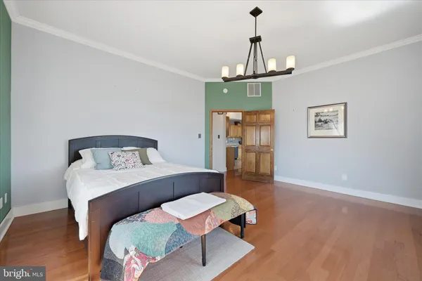 a bathroom with a tub and a large window