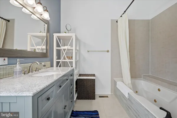 a living room with furniture and large window