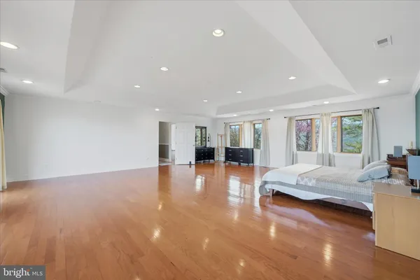 a bathroom with a double vanity sink and mirror