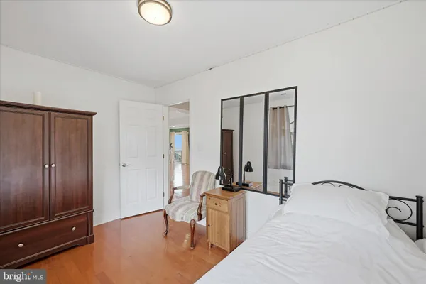 a view of balcony with wooden floor