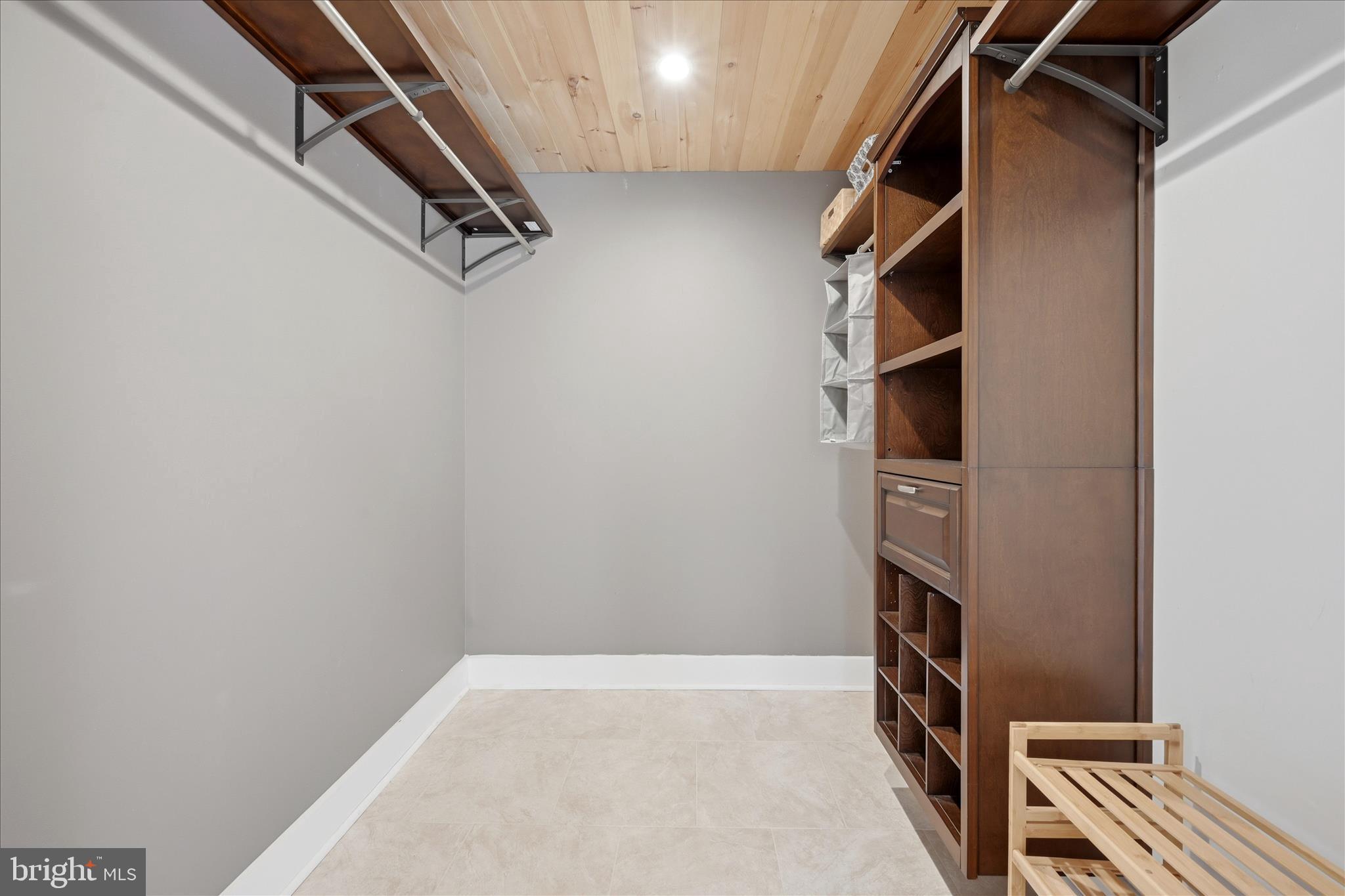 2152 Supinlick Ridge Road Broadway, VA 22815 - Photo 58 of 89 a view of walk in closet with clothes and shoes