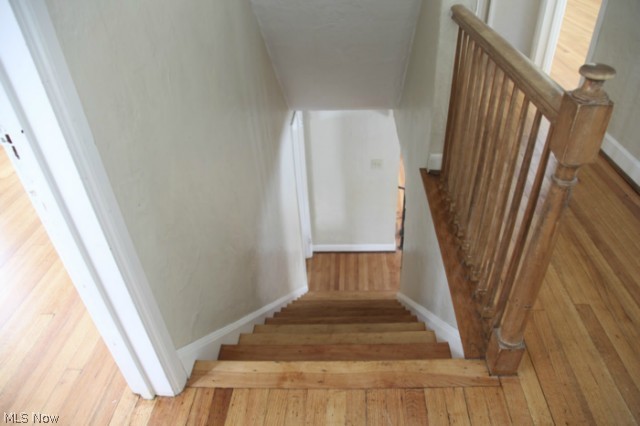 3712 Traynham Road Beachwood, OH 44122 - Photo 14 of 25 Stairwell from first floor to second floor. Continuous wood floors, & stunning plaster ceilings & crown molding can be found on the second floor as well.