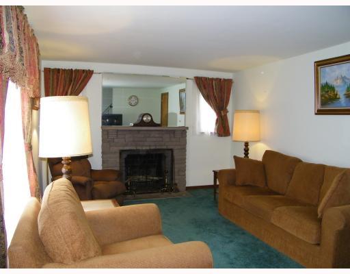 420 Nicholson Road Sewickley, PA 15143 - Photo 2 of 15 Living Room. Log burning fireplace. Hardwood under carpeting.