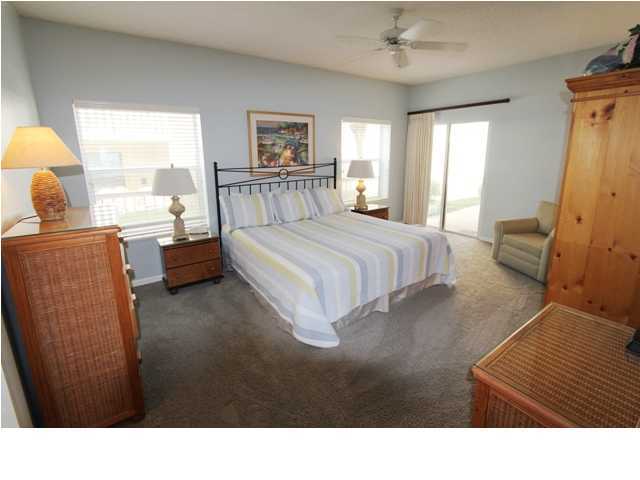 3668 County Road, Unit 101 Santa Rosa Beach, FL 32459 - Photo 16 of 33 a living room with furniture and a large window