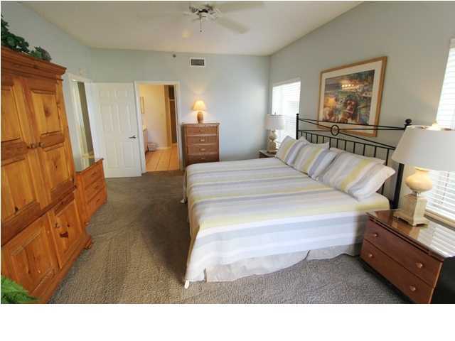 3668 County Road, Unit 101 Santa Rosa Beach, FL 32459 - Photo 19 of 33 a living room with furniture and a flat screen tv