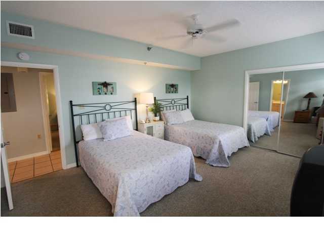 3668 County Road, Unit 101 Santa Rosa Beach, FL 32459 - Photo 25 of 33 a living room with couches and white walls