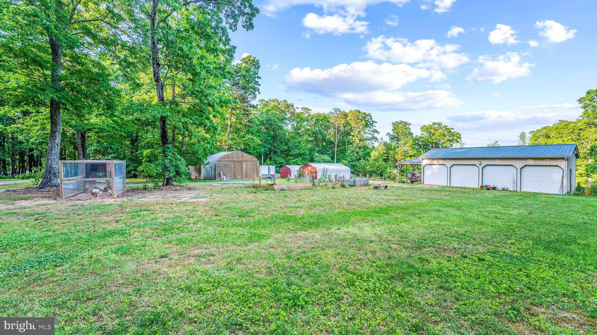 31103 Lumber Road Locust Grove, VA 22508 - Photo 41 of 67 Chicken coop, storage, shed, car ports and garage.
