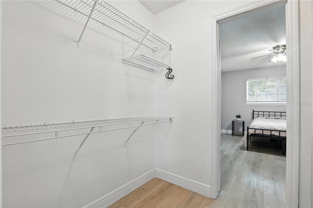 1695 Lee Road, Unit D113 Winter Park, FL 32789 - Photo 12 of 34 a view of a room with racks on the wall