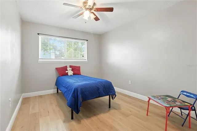 a room with a bed and a window