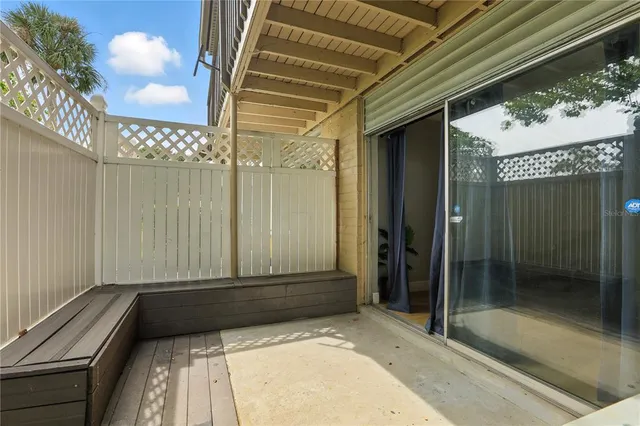 a view of balcony with a potted plant