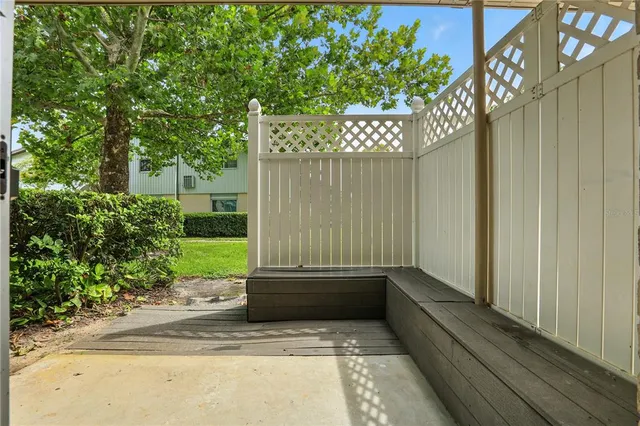 a view of backyard with pathway