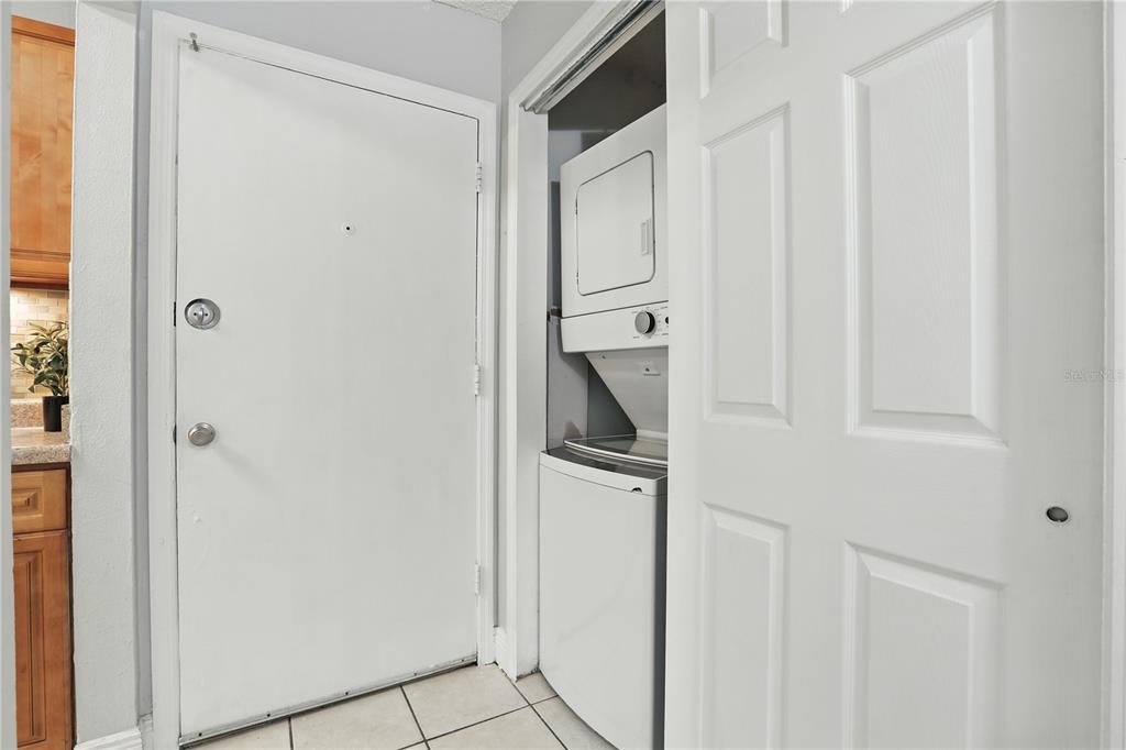 1695 Lee Road, Unit D113 Winter Park, FL 32789 - Photo 19 of 34 a close view of a utility room with dryer and washer