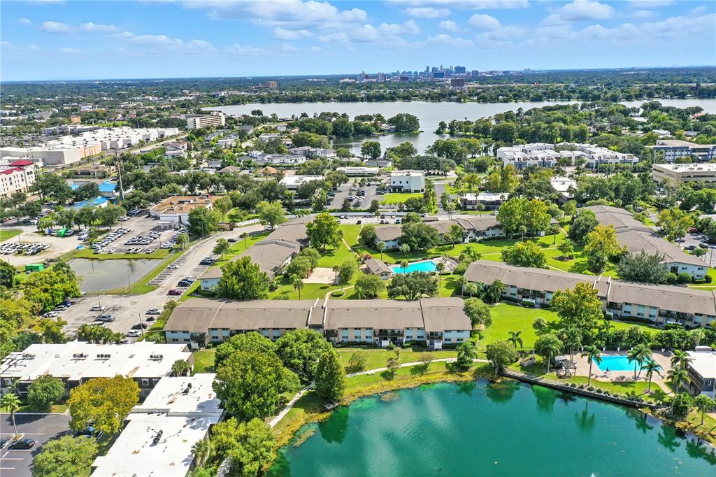 1695 Lee Road, Unit D113 Winter Park, FL 32789 - Photo 20 of 34 an aerial view of a house with a lake view