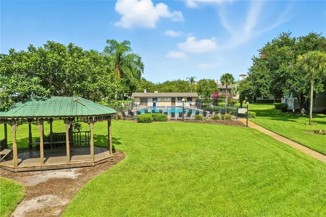 a view of a swimming pool and outdoor space