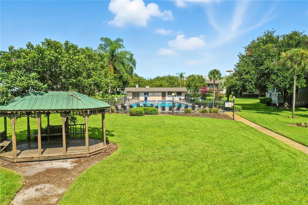 1695 Lee Road, Unit D113 Winter Park, FL 32789 - Photo 25 of 34 a view of a house with a yard porch and sitting area