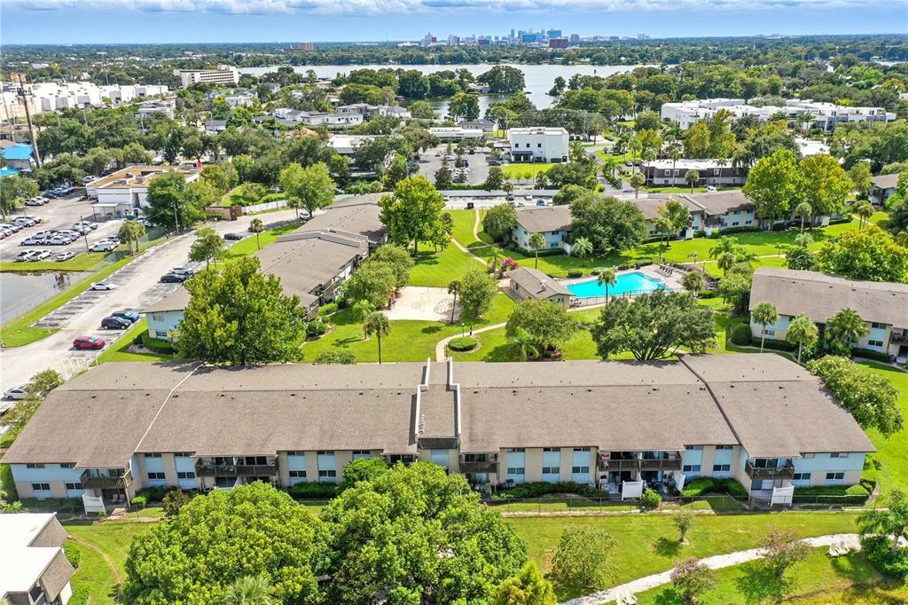 1695 Lee Road, Unit D113 Winter Park, FL 32789 - Photo 29 of 34 an aerial view of a house with a garden