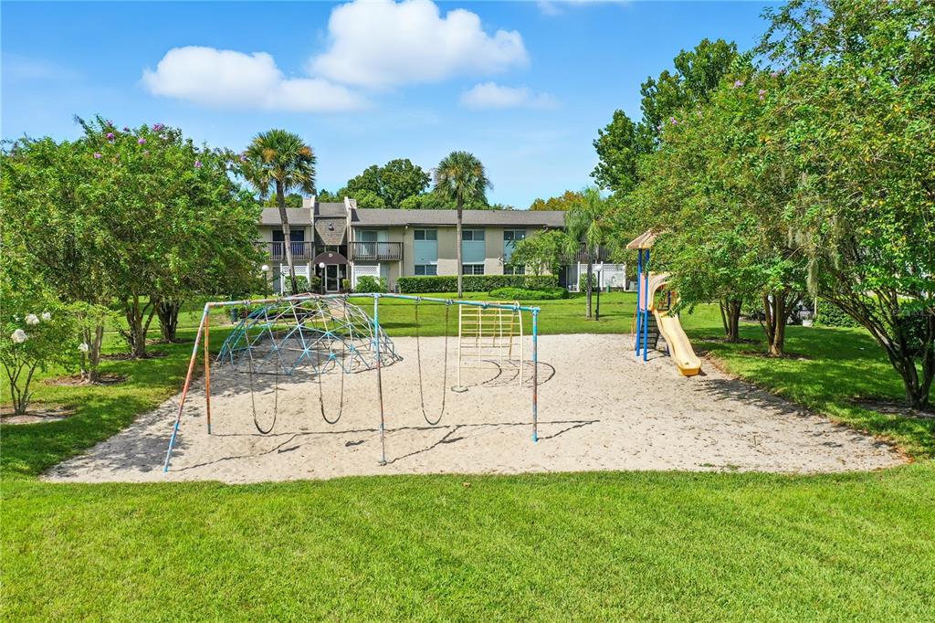 1695 Lee Road, Unit D113 Winter Park, FL 32789 - Photo 30 of 34 a view of a park with a slide