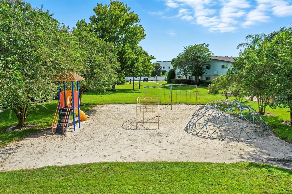 1695 Lee Road, Unit D113 Winter Park, FL 32789 - Photo 31 of 34 a view of a park with large trees