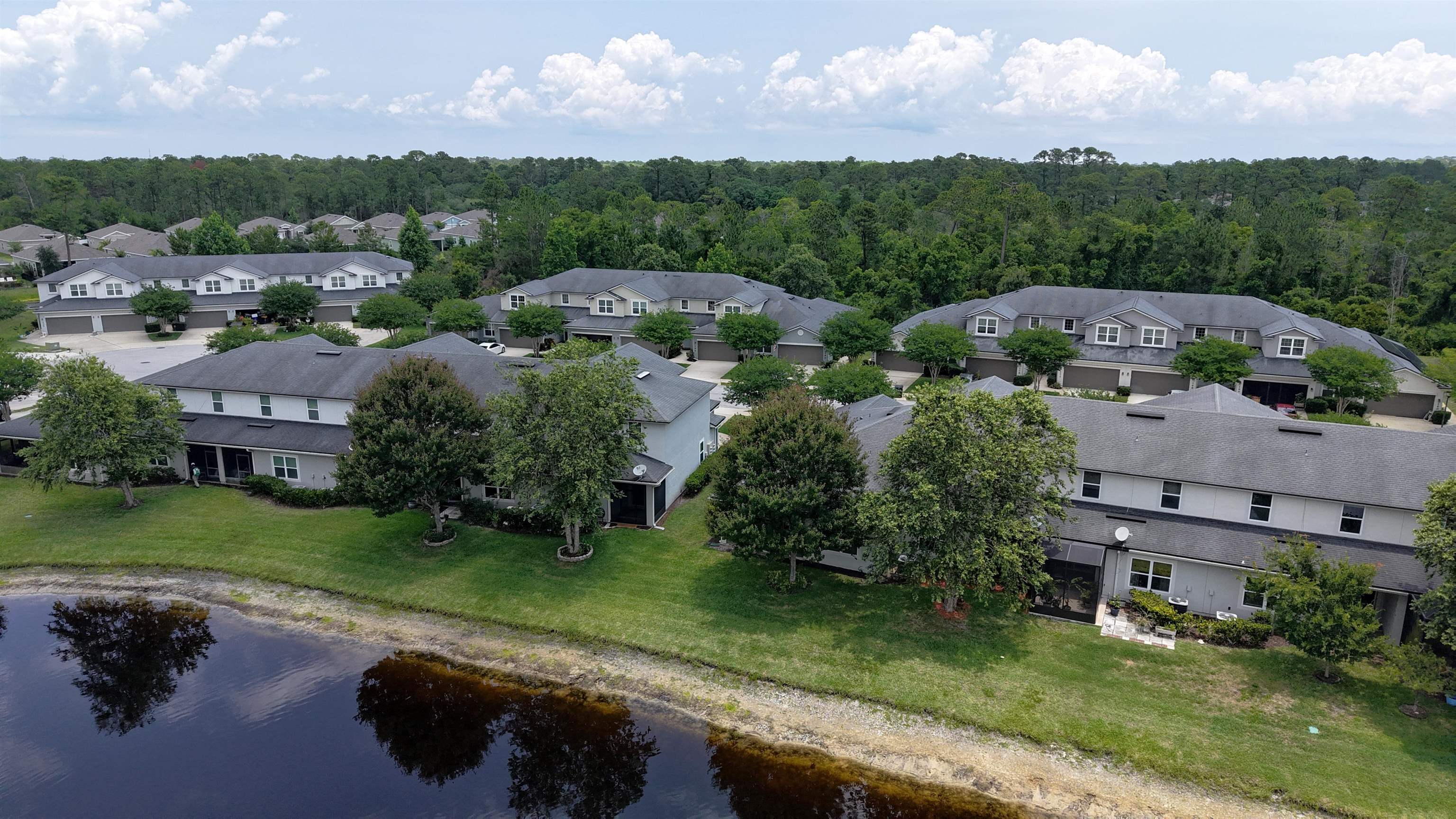 189 Amistad Drive St. Augustine, FL 32086 - Photo 45 of 47 a view of a street with a park