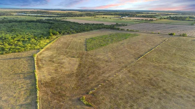 a view of a lake with a big yard