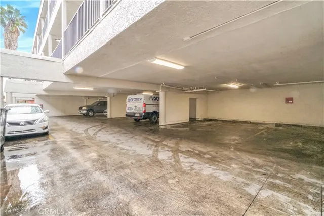 a view of a livingroom with furniture and a garage