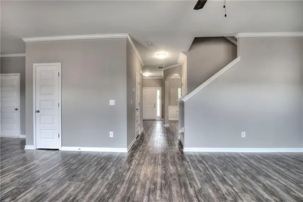 a view of gallery with wooden floor