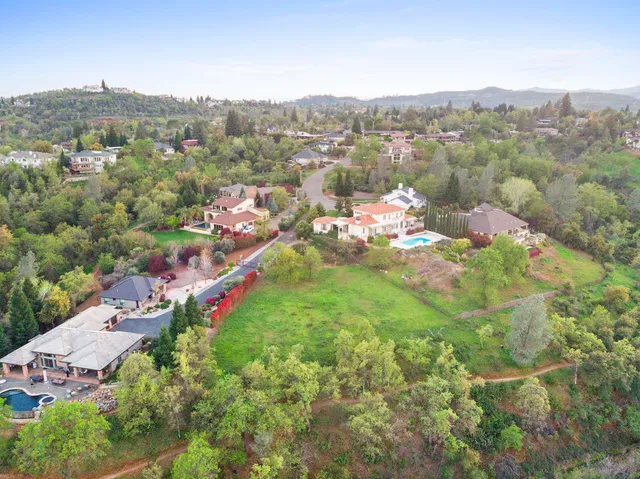 an aerial view of residential house with outdoor space