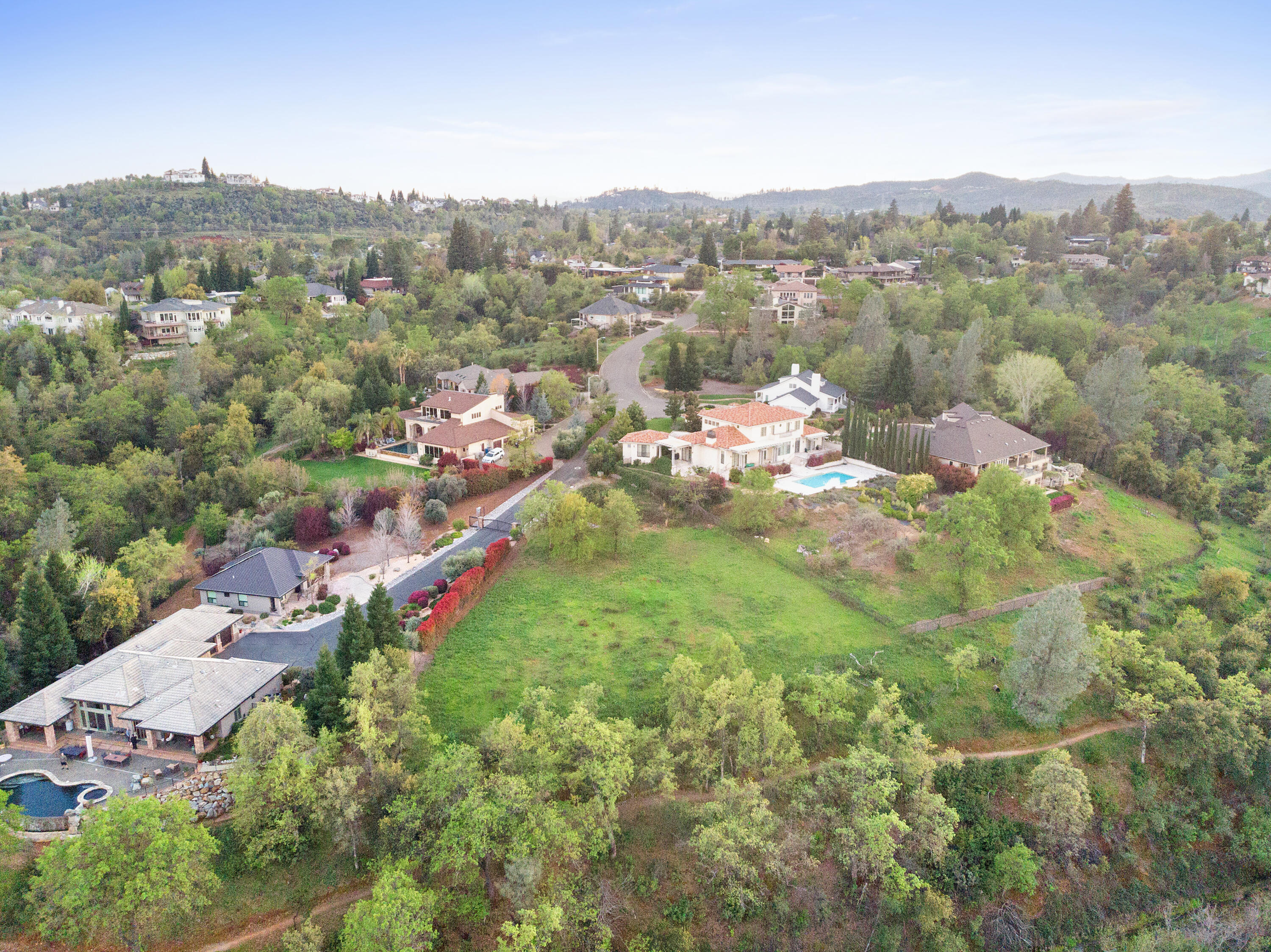 802 Palatine Court Redding, CA 96001 - Photo 7 of 12 a view of a lake with a mountain in the background