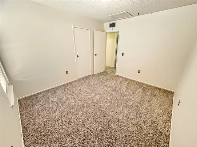an empty room with an entryway