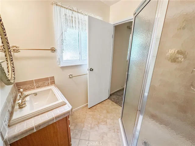 a utility room with a sink dryer and washer