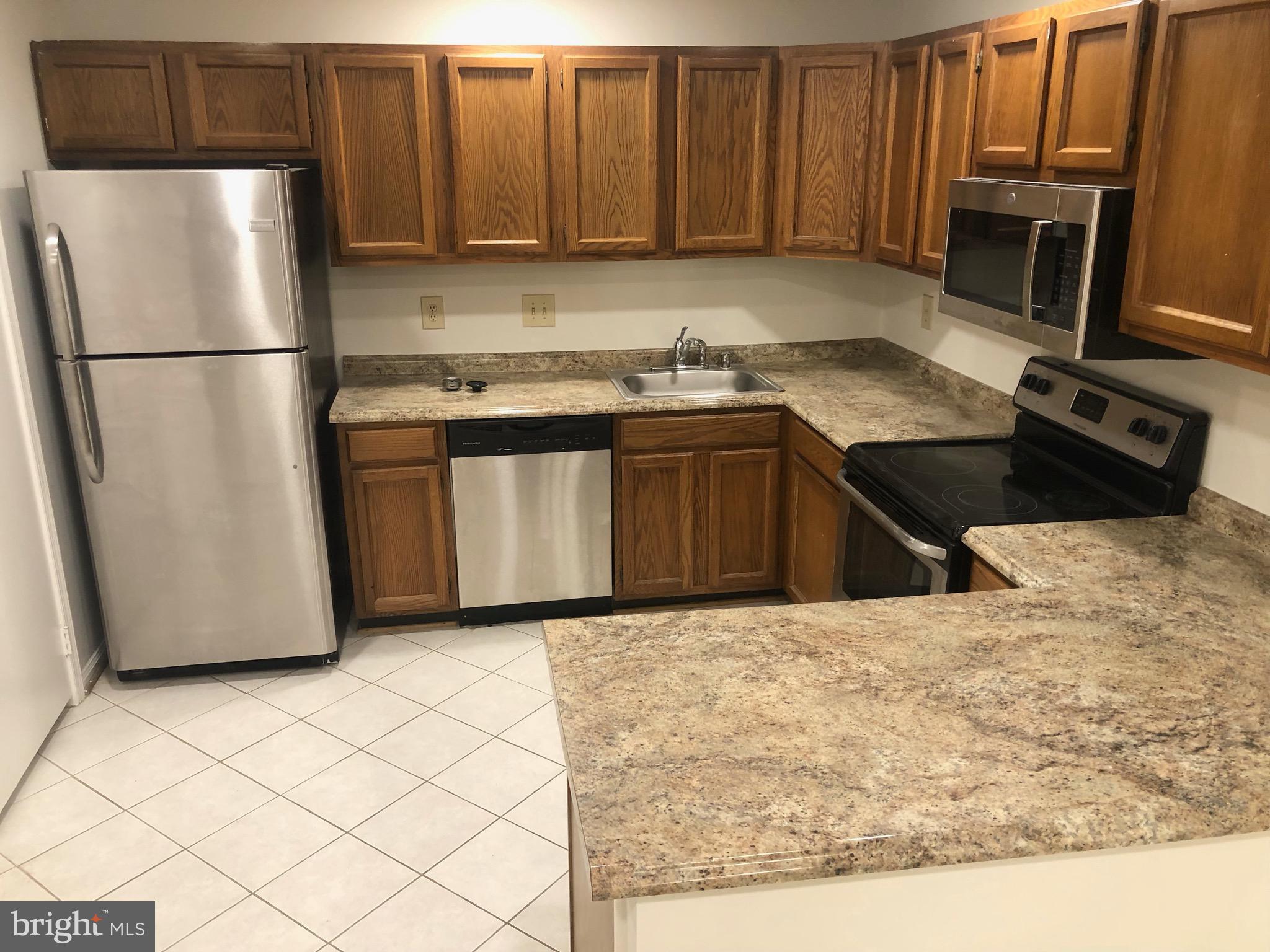 10700 Kings Riding Way, Unit T217 Rockville, MD 20852 - Photo 6 of 18 Kitchen