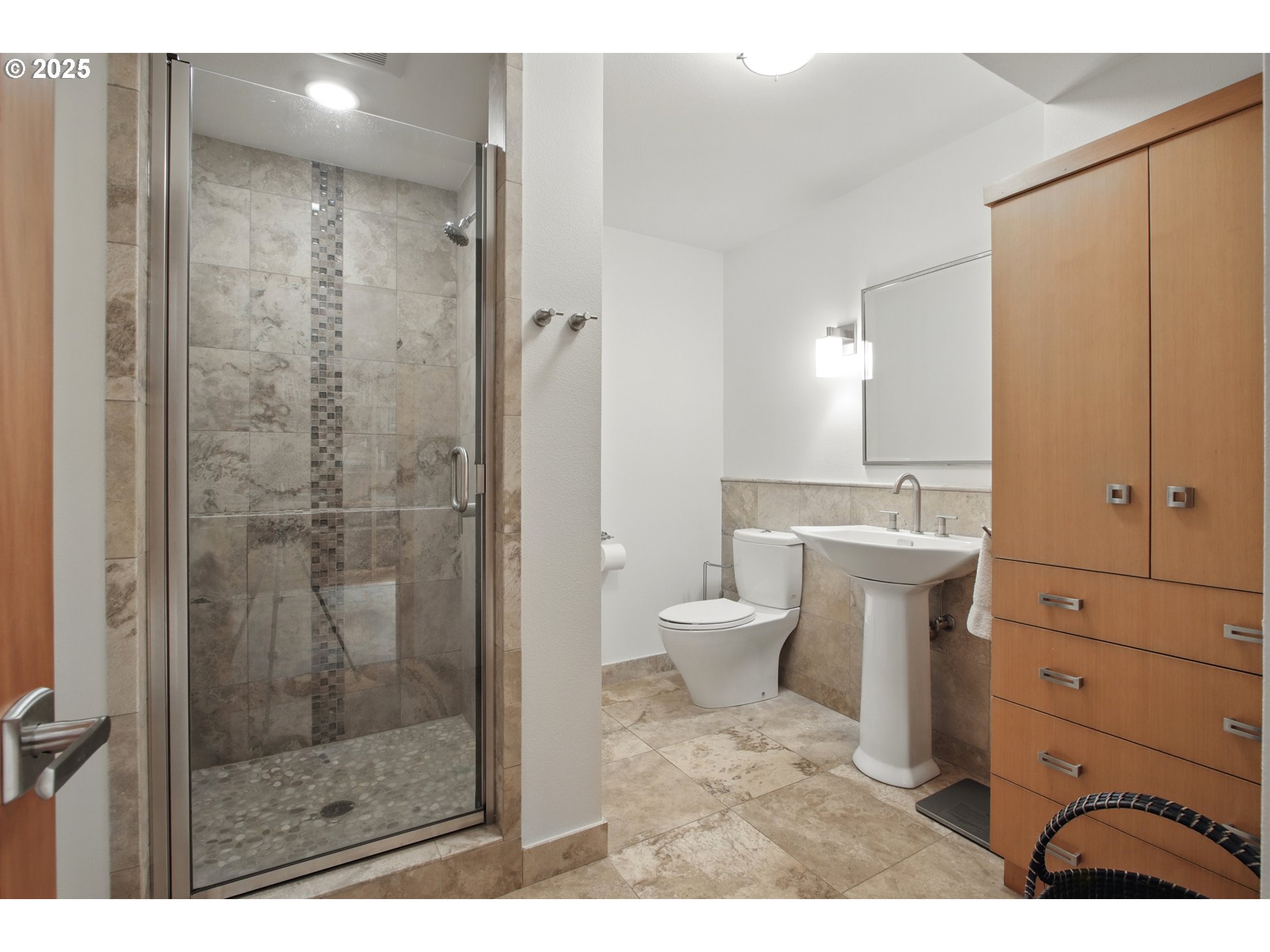 6335 Northwest Cornell Road Portland, OR 97210 - Photo 32 of 41 a bathroom with a shower a toilet and a sink