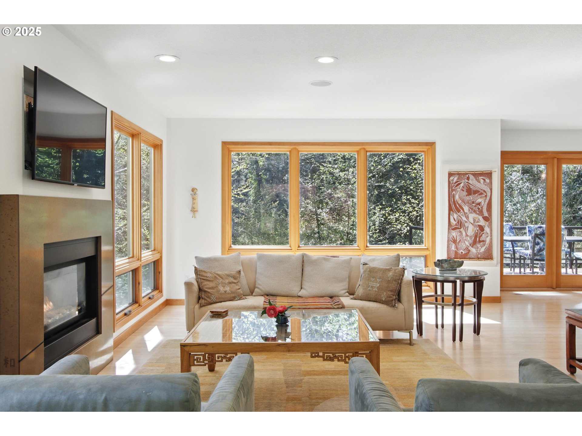 6335 Northwest Cornell Road Portland, OR 97210 - Photo 6 of 41 a living room with furniture a flat screen tv and a fireplace