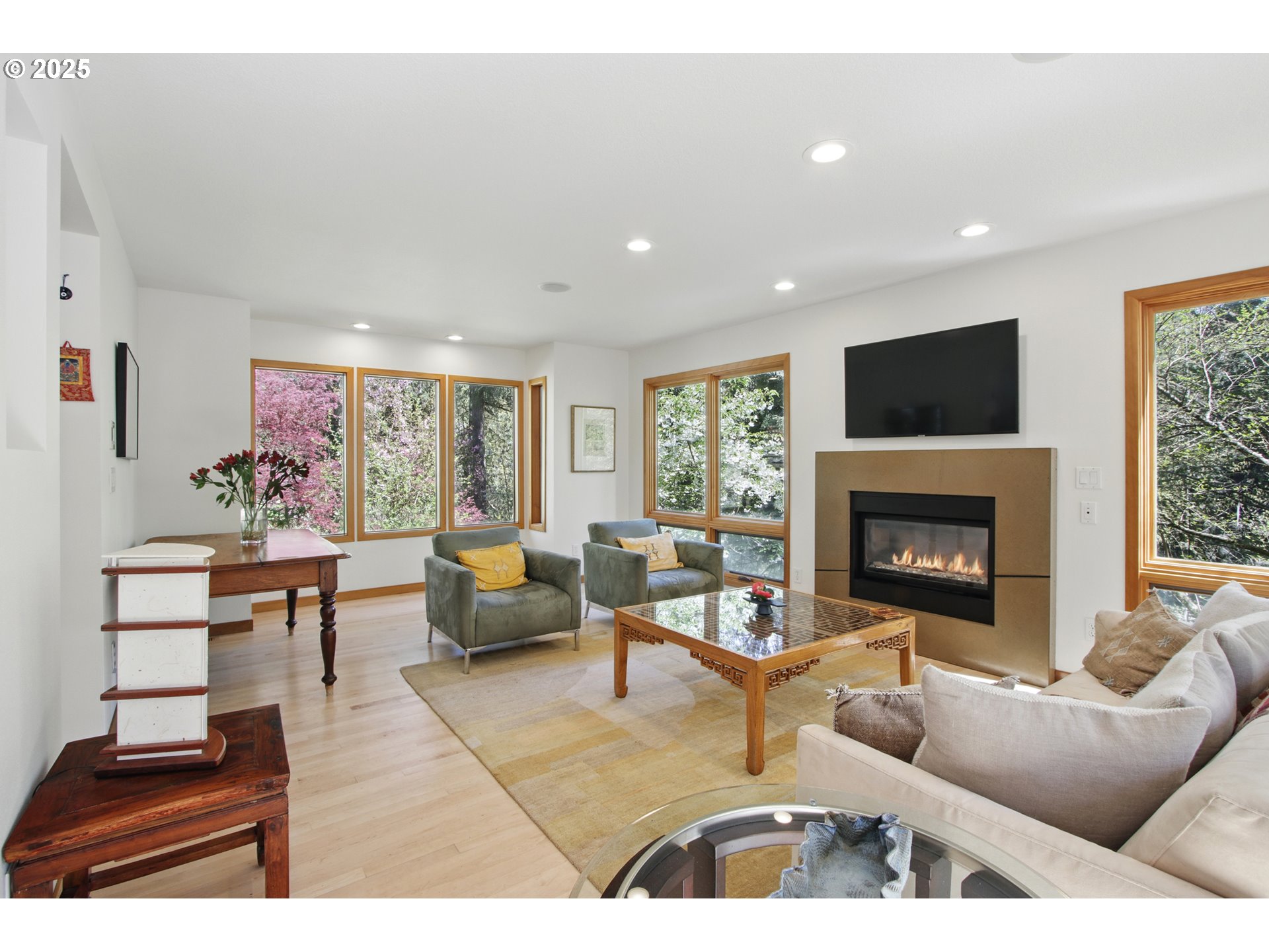 6335 Northwest Cornell Road Portland, OR 97210 - Photo 8 of 41 a living room with furniture and a fireplace