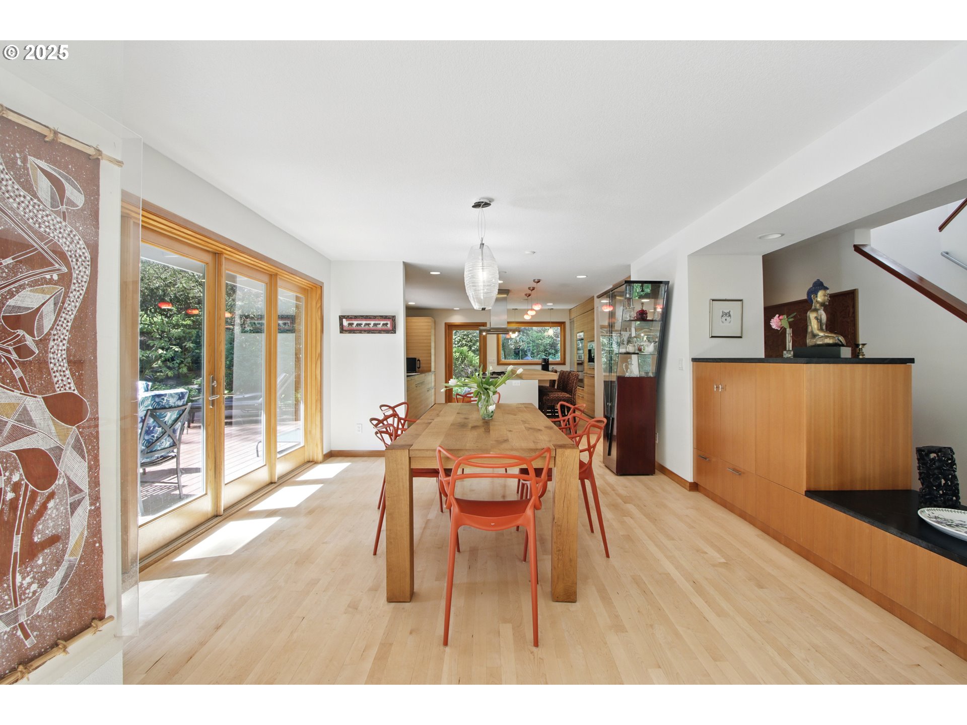 6335 Northwest Cornell Road Portland, OR 97210 - Photo 9 of 41 a dining room with furniture and wooden floor