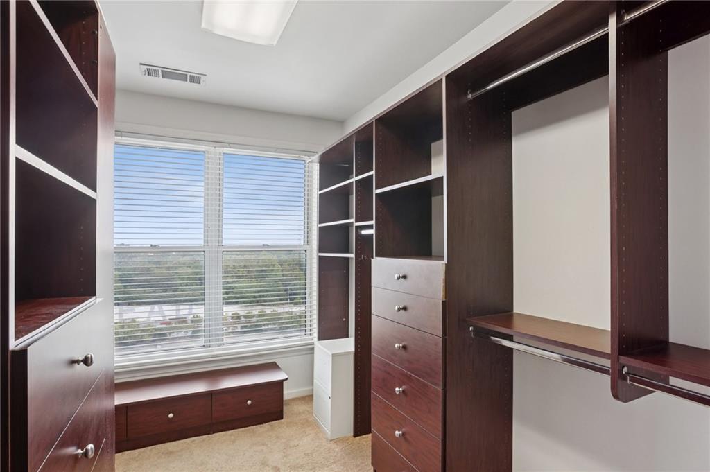 3334 Peachtree Road Northeast, Unit 1109 Atlanta, GA 30326 - Photo 11 of 27 a room with window and flat screen tv