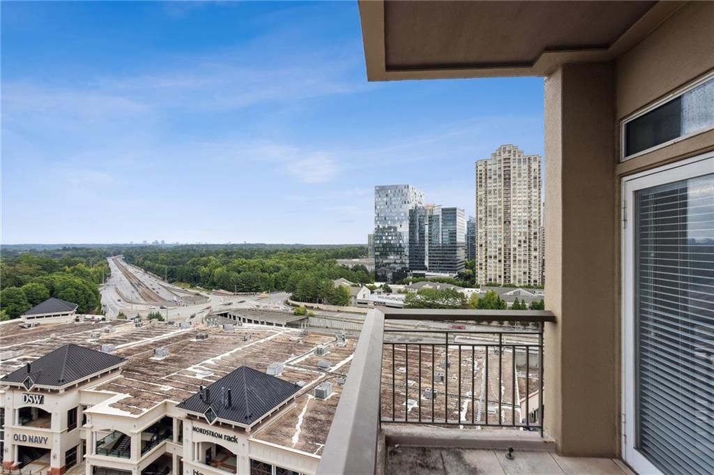 3334 Peachtree Road Northeast, Unit 1109 Atlanta, GA 30326 - Photo 16 of 27 a view of a balcony with city view
