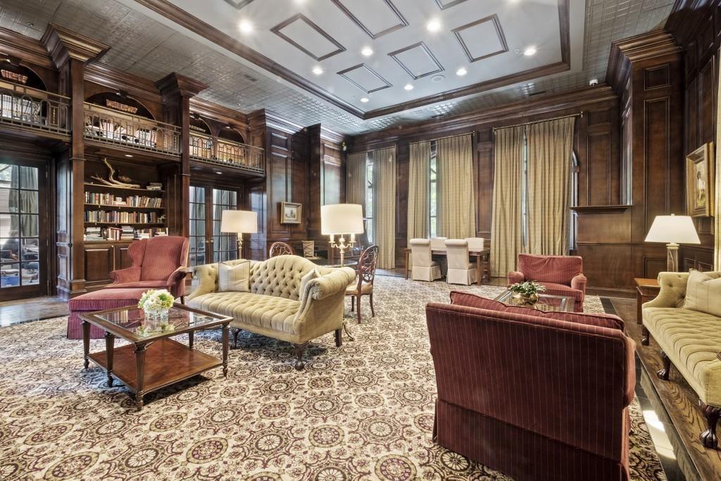 3334 Peachtree Road Northeast, Unit 1109 Atlanta, GA 30326 - Photo 20 of 27 a living room with furniture and a large window