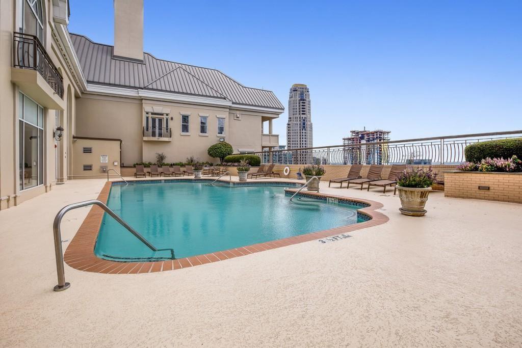 3334 Peachtree Road Northeast, Unit 1109 Atlanta, GA 30326 - Photo 23 of 27 a view of a swimming pool with outdoor seating