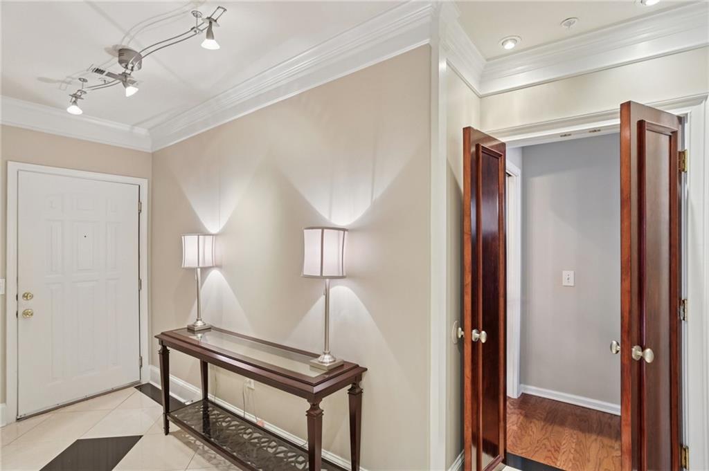 3334 Peachtree Road Northeast, Unit 1109 Atlanta, GA 30326 - Photo 7 of 27 a view of a hallway with front door