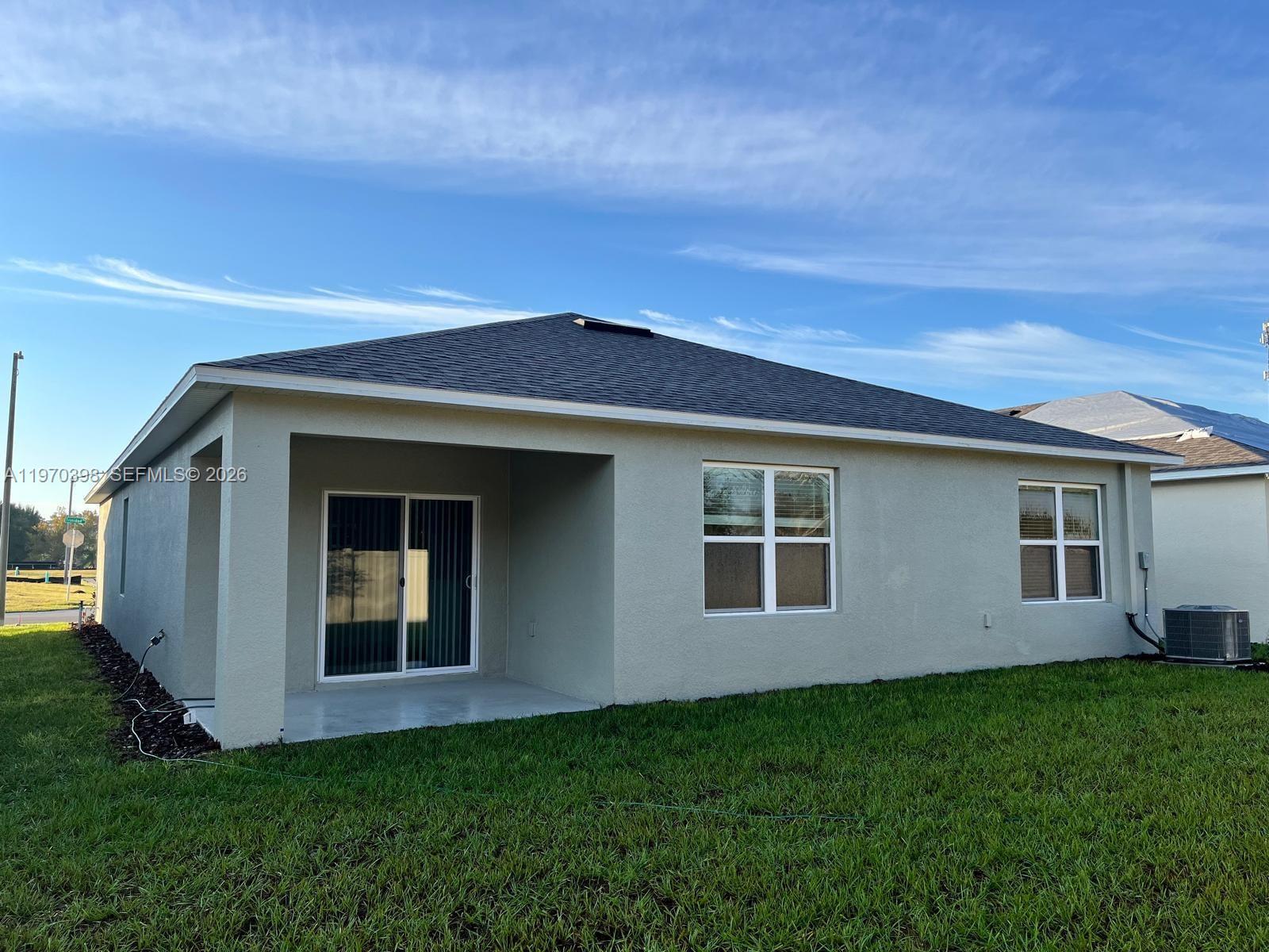 2710 Trinidad Road Haines City, FL 33844 - Photo 13 of 13 a view of a house with backyard