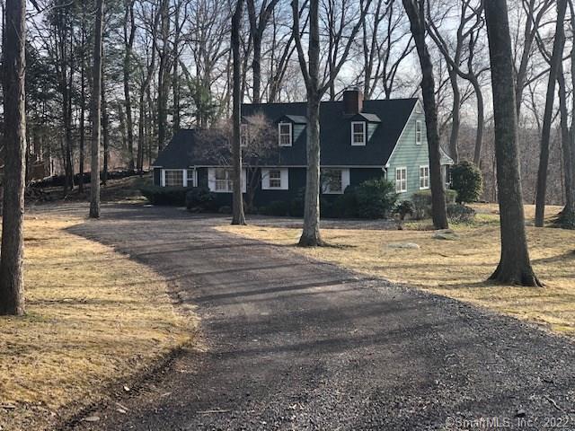 A 2 bed ranch with a full attic in the style of a cape cod on 2 premier acres ready to remodel and expand